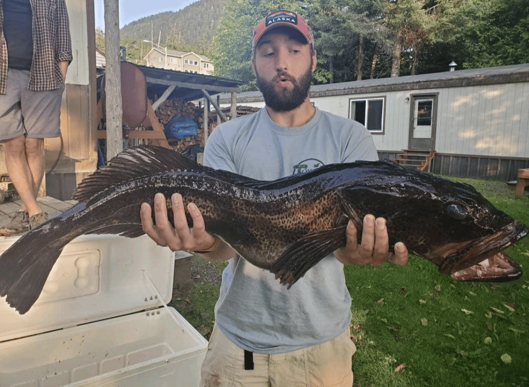 Jack Fredrickson holding a large fish